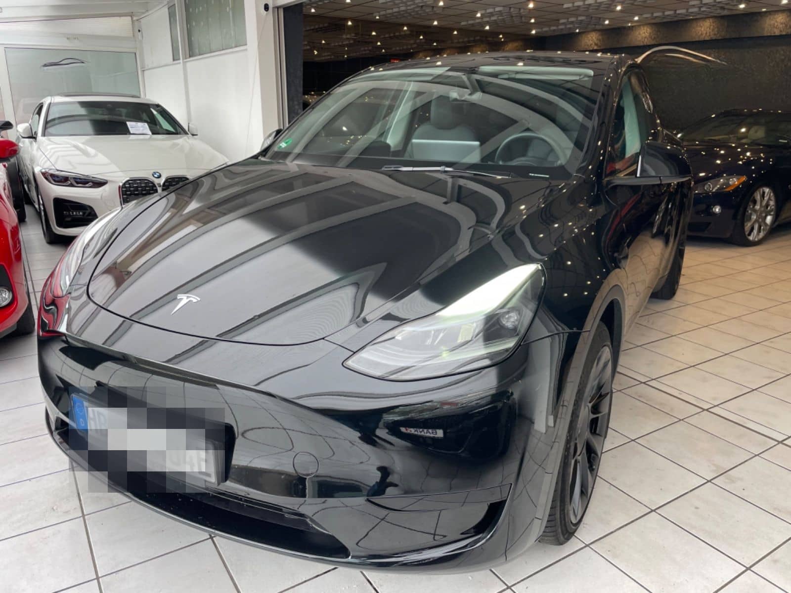 Tesla Model Y Basis RWD Garantie 1.Hand foto 1