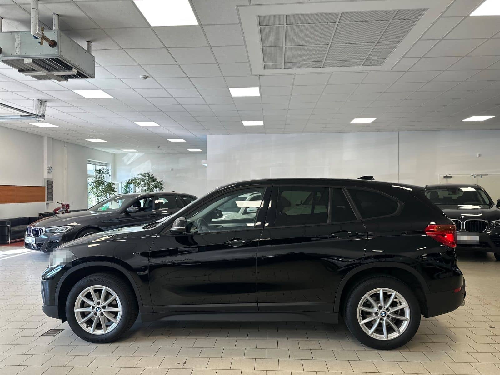 BMW X1 sDrive 18i Navi/Panorama/ParkAssist/Tempomat foto 8