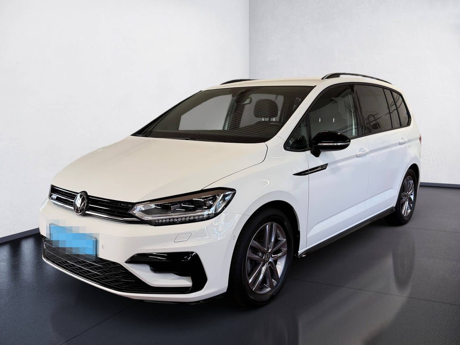 Volkswagen Touran 1.5 TSI R-Line BlackStyle DSG LED Navi AC foto 2