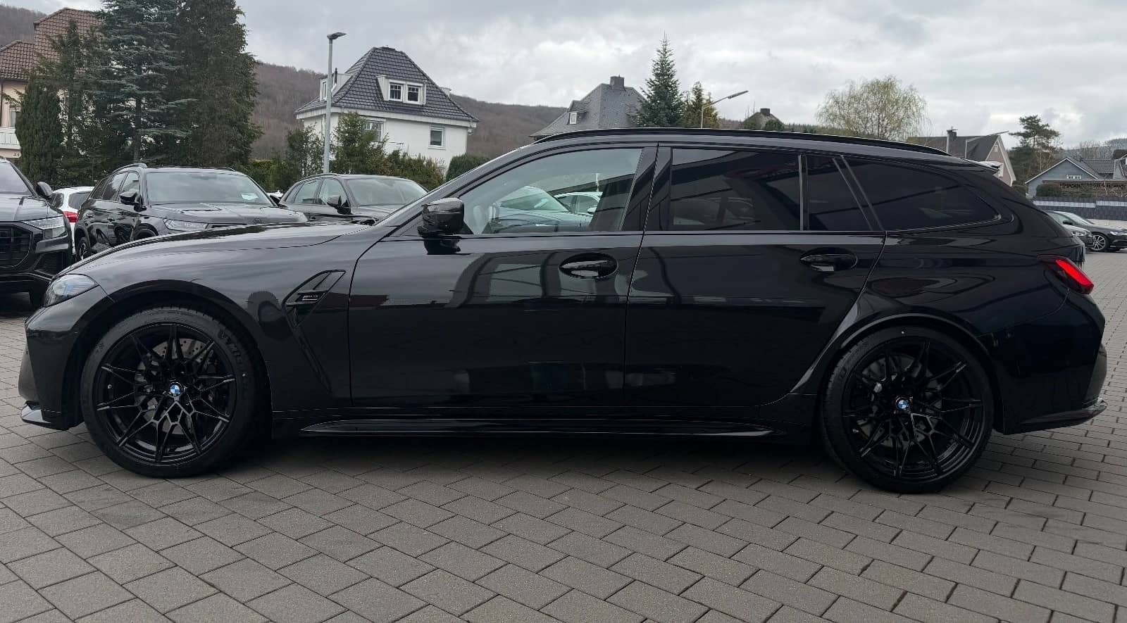 BMW M3 Touring Competition xDrive Performance Carbon foto 4