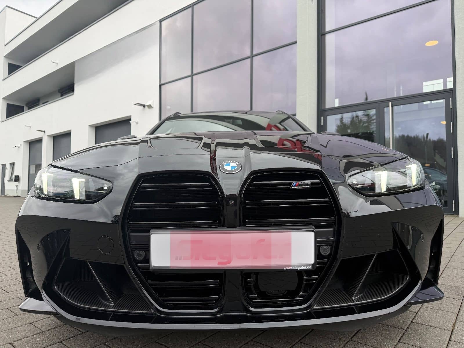 BMW M3 Touring Competition xDrive Performance Carbon foto 6