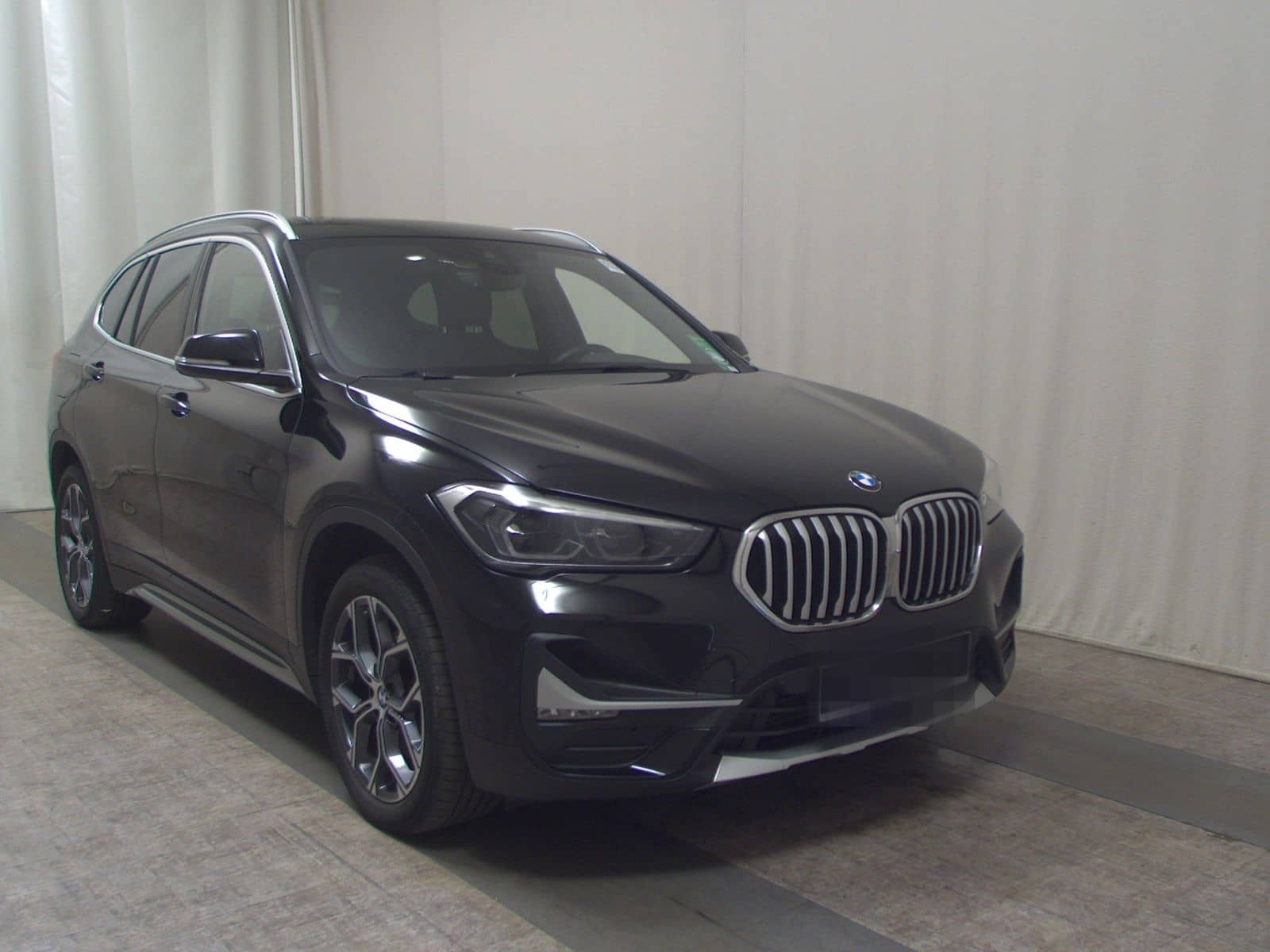 BMW X1 sDrive18d X-Line T-Leder Navi LED+ Pano AHK foto 3