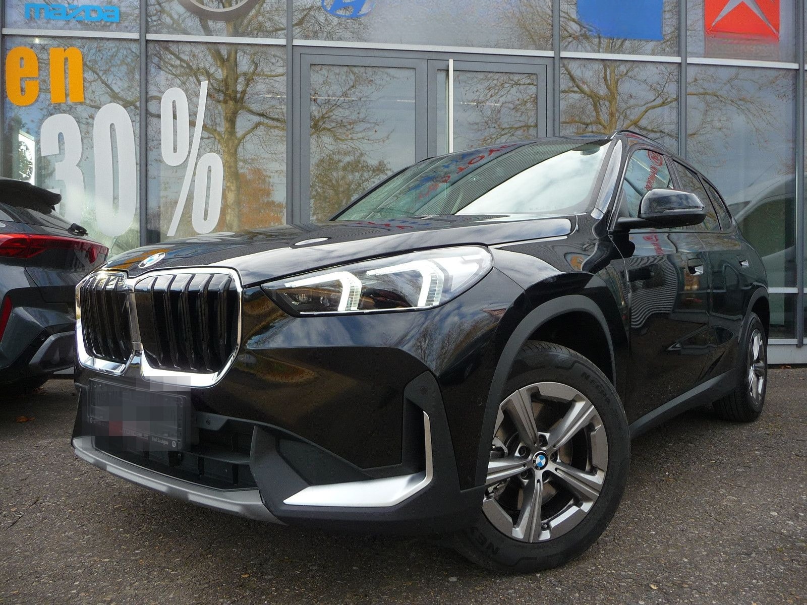 BMW X1 20 i sDrive Aut. PANO/AHK/Premium+TravelPaket foto 1