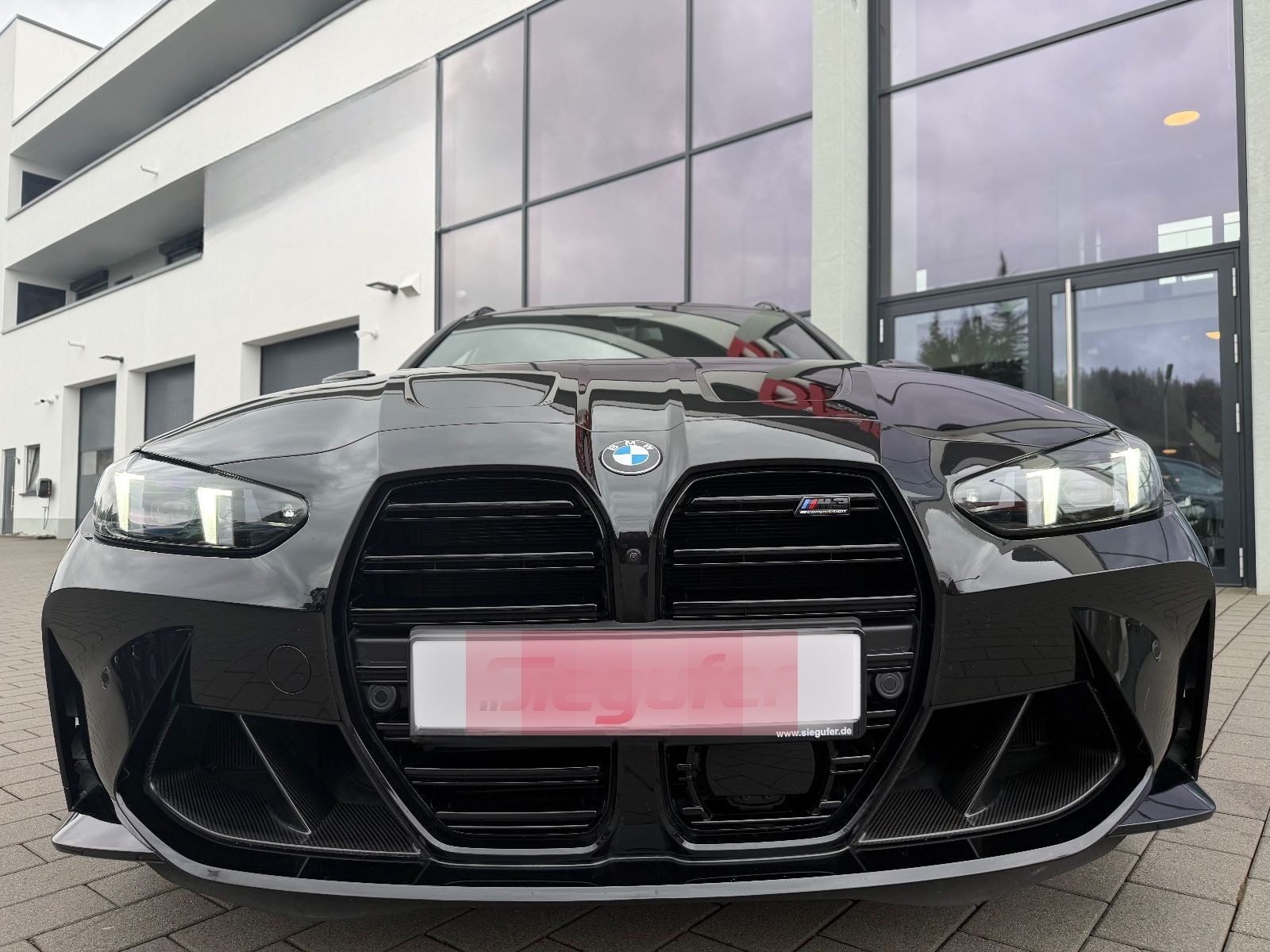 BMW M3 Touring Competition xDrive Performance Carbon foto 6