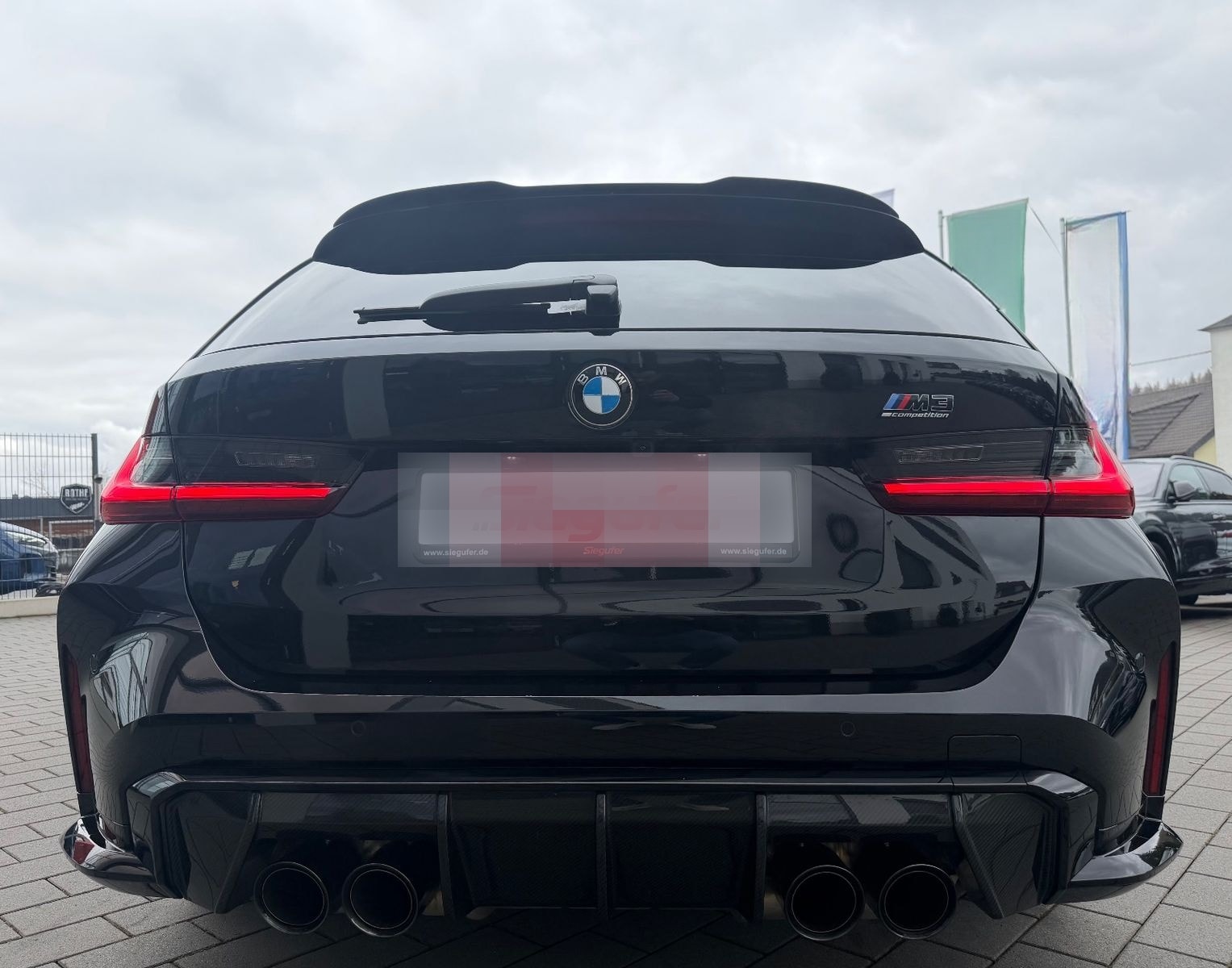 BMW M3 Touring Competition xDrive Performance Carbon foto 9