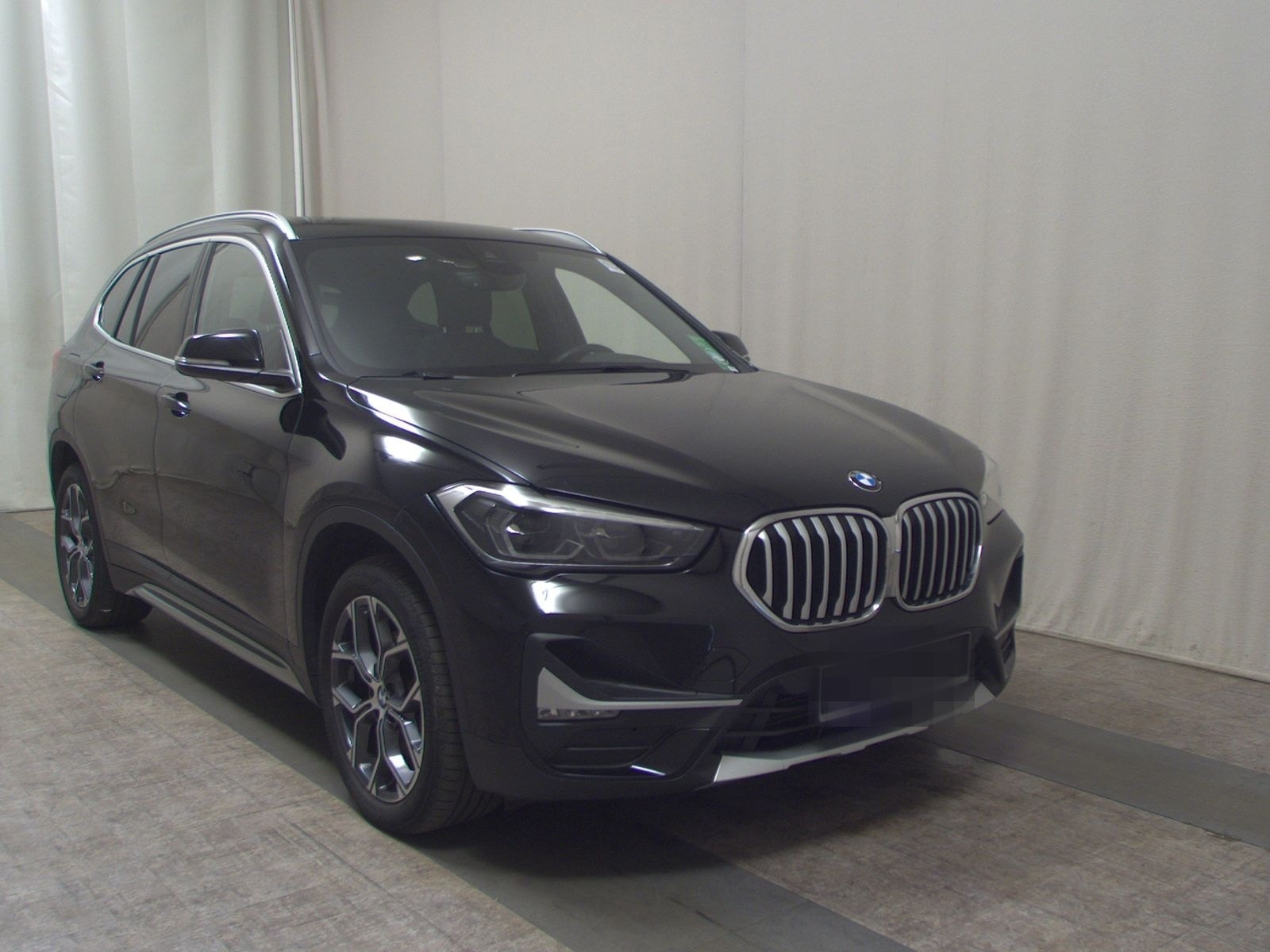 BMW X1 sDrive18d X-Line T-Leder Navi LED+ Pano AHK foto 3